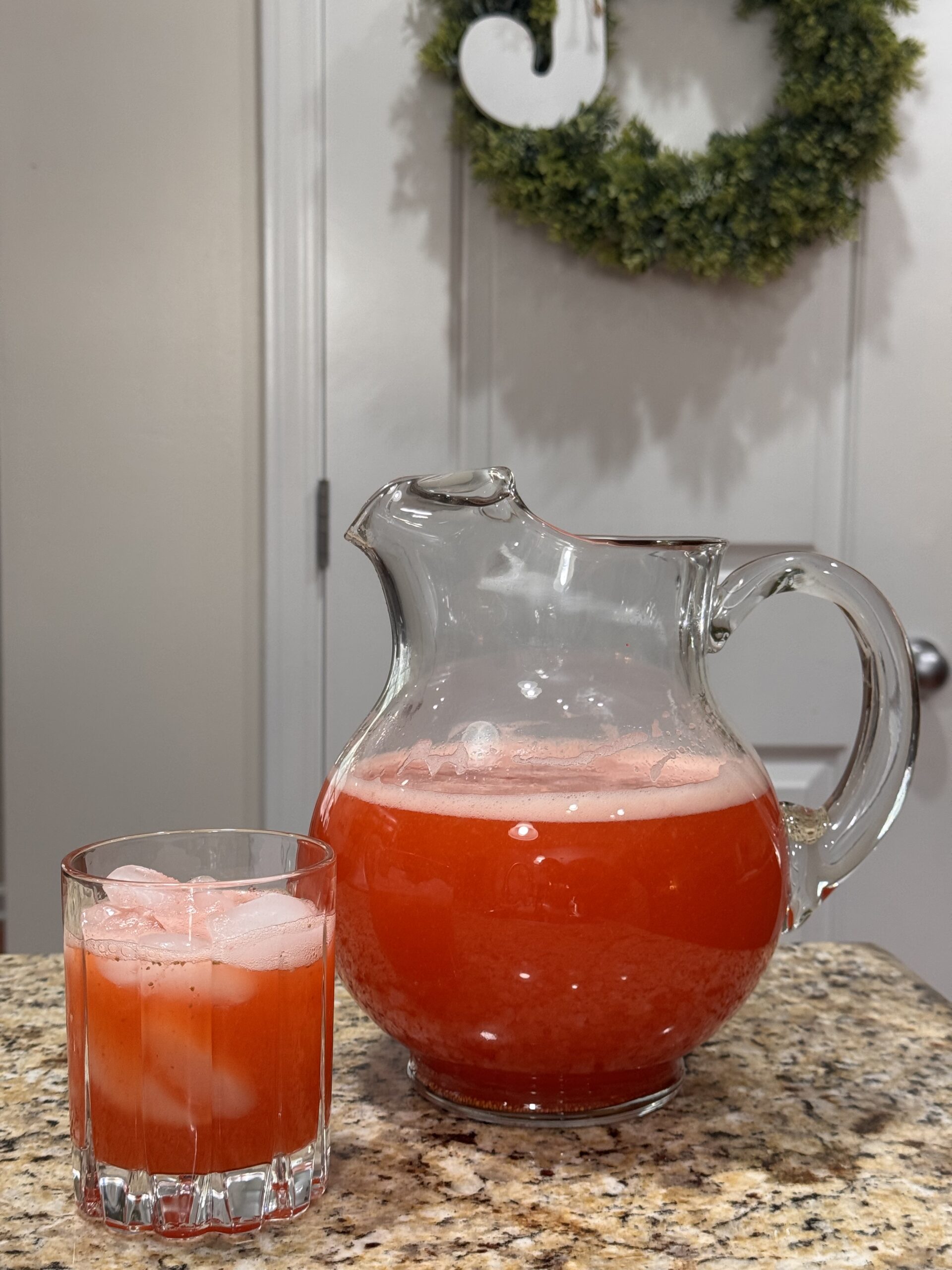 Pitcher and glass of strawberry lemonade