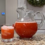 Pitcher and glass of strawberry lemonade