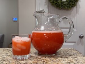 Pitcher and glass of strawberry lemonade