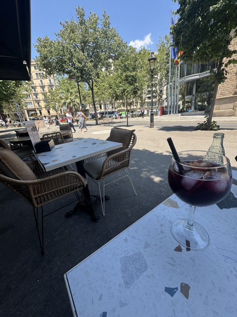 Outdoor patio with a glass of sangria